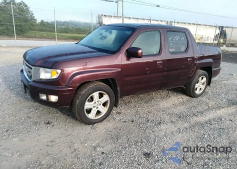 2011 Honda Ridgeline Rtl z USA, uszkodzony, nr VIN 5FPYK1F58BB004587